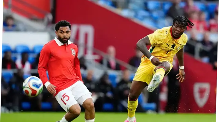 Pertandingan Sepak Bola Wales vs Ghana: Drama Gol Menit Akhir dan Dampaknya Terhadap Perekonomian Nasional